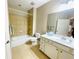 Clean bathroom with tub, shower, and updated vanity at 4140 Lanier Ridge Walk # 104, Cumming, GA 30041