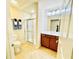 Bathroom with shower, toilet and modern vanity at 4140 Lanier Ridge Walk # 104, Cumming, GA 30041