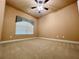Spacious bedroom with carpet flooring and ceiling fan at 4140 Lanier Ridge Walk # 104, Cumming, GA 30041