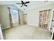 Spacious bedroom with carpeted floors and large windows at 4140 Lanier Ridge Walk # 104, Cumming, GA 30041