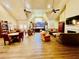 Clubhouse with a fireplace, kitchen, and seating area at 4140 Lanier Ridge Walk # 104, Cumming, GA 30041
