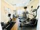 Fitness center with treadmills, elliptical machines, and weights at 4140 Lanier Ridge Walk # 104, Cumming, GA 30041