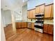 Spacious kitchen featuring granite countertops and stainless steel appliances at 4140 Lanier Ridge Walk # 104, Cumming, GA 30041