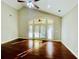 Living area with hardwood floors and large windows at 4140 Lanier Ridge Walk # 104, Cumming, GA 30041