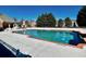 Inviting community pool with brick coping and ample lounge space at 4140 Lanier Ridge Walk # 104, Cumming, GA 30041