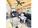 Front porch with wicker furniture and ceiling fan at 4140 Lanier Ridge Walk # 104, Cumming, GA 30041