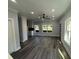 Open living space with hardwood floors and lots of natural light at 935 Pelham Nw St, Atlanta, GA 30318