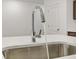 Modern kitchen sink with a pull-down faucet at 1103 Lockhart Way, Douglasville, GA 30135