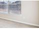 Bedroom with window and neutral wall paint at 189 Aylesbury Blvd, Mcdonough, GA 30252