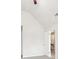 Bright bedroom featuring vaulted ceilings and a door to hallway at 189 Aylesbury Blvd, Mcdonough, GA 30252