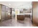 Spacious kitchen with dark wood cabinets and stainless steel appliances at 189 Aylesbury Blvd, Mcdonough, GA 30252