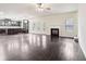 Open living room with hardwood floors and fireplace at 189 Aylesbury Blvd, Mcdonough, GA 30252