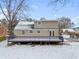 Spacious deck overlooks a snow-covered backyard at 2003 Cogar Dr, Decatur, GA 30032