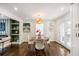 Elegant dining room with hardwood floors and a round table with four chairs at 2003 Cogar Dr, Decatur, GA 30032