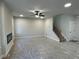 Spacious basement with a fireplace and neutral walls at 4220 Easter Lily Ave (Lot3), Buford, GA 30519