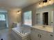 Double vanity bathroom with soaking tub and walk-in shower at 4220 Easter Lily Ave (Lot3), Buford, GA 30519