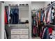 Walk-in closet features custom shelving and storage solutions for clothing, shoes, and accessories at 924 Wemberley Ln, Marietta, GA 30064