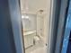 Bathroom with white tiled shower and marble floors at 201 Peyton Sw Pl, Atlanta, GA 30311