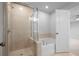 Bathroom featuring walk-in shower, and tub at 1646 Tide Mill Rd, Cumming, GA 30040