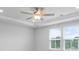 Bedroom with windows, and a ceiling fan at 1646 Tide Mill Rd, Cumming, GA 30040