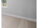 Neutral carpeted bedroom with white trim and a window at 1646 Tide Mill Rd, Cumming, GA 30040