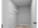 Walk-in closet with wire shelving at 1646 Tide Mill Rd, Cumming, GA 30040