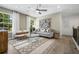 Bright living room showcasing stylish decor, natural light, and comfortable seating with an open plan at 1646 Tide Mill Rd, Cumming, GA 30040