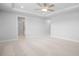 Spacious main bedroom with carpet floors and neutral walls at 1646 Tide Mill Rd, Cumming, GA 30040