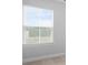 Interior view through a window with blinds at 1646 Tide Mill Rd, Cumming, GA 30040