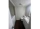 Small bathroom with granite vanity, toilet and washer-dryer at 1867 Myrtle Sw Dr # 26, Atlanta, GA 30311