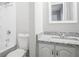 Clean bathroom, granite countertop, and white cabinets at 1867 Myrtle Sw Dr # 26, Atlanta, GA 30311