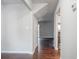 Dark hardwood floors in a hallway leading to the living areas at 1867 Myrtle Sw Dr # 26, Atlanta, GA 30311