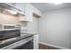 Stainless steel range and granite countertops in the kitchen at 1867 Myrtle Sw Dr # 26, Atlanta, GA 30311