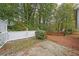 Spacious backyard with deck and wooden fence at 1022 Hicksmil Sw Dr, Marietta, GA 30060