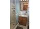 Clean bathroom with shower, vanity, and tiled floor at 2006 Goode Rd, Conyers, GA 30094