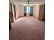Large bedroom with carpet, ceiling fan and ample closet space at 2006 Goode Rd, Conyers, GA 30094