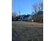 Ranch style home with large yard and covered porch at 2006 Goode Rd, Conyers, GA 30094