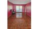 Bright living room featuring hardwood floors and large windows at 2006 Goode Rd, Conyers, GA 30094