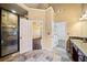Luxurious bathroom with walk-in shower and separate vanities at 2870 The Terraces Way, Dacula, GA 30019