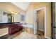 Main bathroom with soaking tub, double vanity, and walk-in shower at 2870 The Terraces Way, Dacula, GA 30019