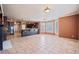 Open concept dining area with tile floors and fireplace at 2870 The Terraces Way, Dacula, GA 30019