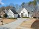 Two-story house with gray roof, driveway, and basketball goal at 2870 The Terraces Way, Dacula, GA 30019