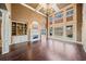 Spacious living room with hardwood floors, fireplace, and high ceilings at 2870 The Terraces Way, Dacula, GA 30019