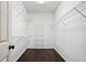 Spacious walk-in closet with wire shelving and dark hardwood floors at 2870 The Terraces Way, Dacula, GA 30019