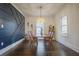 Modern farmhouse dining room with dark hardwood floors at 2880 Joyce Ave, Decatur, GA 30032