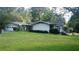 Ranch home with a large yard and attached two-car garage at 4625 Gaydon Rd, Powder Springs, GA 30127