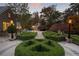 Beautifully landscaped backyard with a pool and manicured hedges at 3685 Paces Ferry Nw Rd, Atlanta, GA 30327