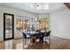 Elegant dining area featuring hardwood floors and natural light-filled windows at 3685 Paces Ferry Nw Rd, Atlanta, GA 30327