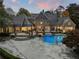 Beautiful backyard view of home featuring a pool, spa, and patio at 3685 Paces Ferry Nw Rd, Atlanta, GA 30327