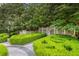 Garden featuring manicured hedges and a stone pathway at 3685 Paces Ferry Nw Rd, Atlanta, GA 30327
